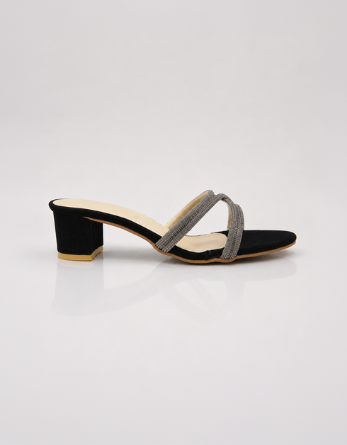 Black embellished low block heel slippers for women with shimmering cross strap design and soft padded comfort.
