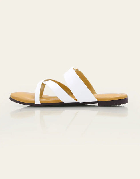 White Stravia criss-cross flats with jeweled buckle