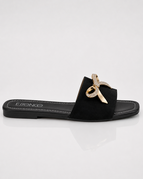 Side view of Aveen black bow embellished flat sandals for women