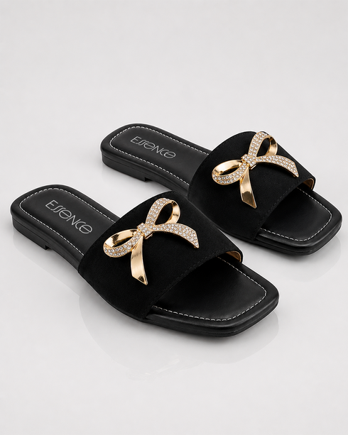 Pair of Aveen black flat sandals with embellished bow detail