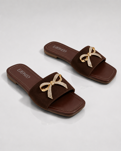 Pair of Aveen brown women's flat sandals with embellished bow detail