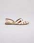 Side view of beige woven flat sandals with criss cross straps and slingback ankle strap, elegant women sandals for daily wear, lightweight summer footwear Pakistan