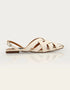 Side view of beige woven flat sandals with criss cross straps and slingback ankle strap, elegant women sandals for daily wear, lightweight summer footwear Pakistan