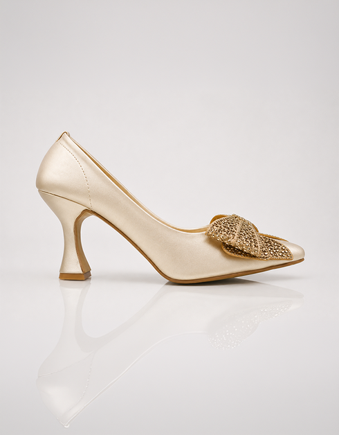 Golden pointed toe pumps for women with decorative crystal bow and elegant low heel