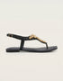 Side view of black flat T-strap sandals with crystal design, elegant women footwear for summer, durable comfortable sandals for daily wear and formal occasions