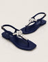 Top view of blue women sandals with silver crystal embellishments, stylish T-strap flat sandals, summer footwear for girls Pakistan, comfortable and fashionable sandals