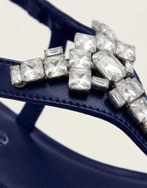 Close-up of blue T-strap sandals with silver rhinestone crystal detailing, premium ladies sandals Pakistan, elegant flat sandals for casual and party wear