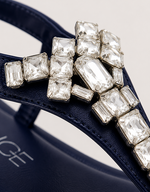 Close-up of blue T-strap sandals with silver rhinestone crystal detailing, premium ladies sandals Pakistan, elegant flat sandals for casual and party wear