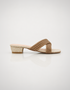 Pair of gold embellished cross strap low block heel slippers with elegant shimmer finish.