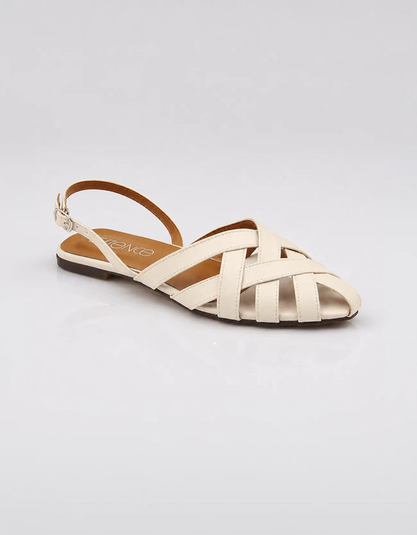 Side angle of cream multi-strap flat sandals with woven criss cross design and back strap, trendy women sandals Pakistan, durable comfortable footwear for everyday use