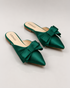 Pair of handcrafted green pointed toe flat mules for women