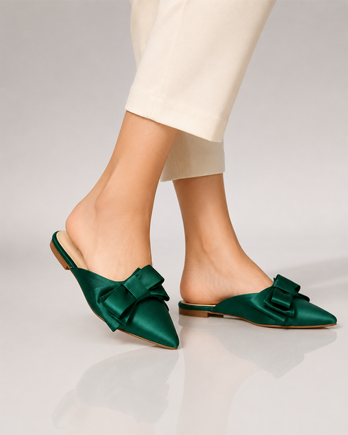 Model wearing green pointed toe flat mules for women