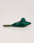 Side profile of green pointed toe flat mules with elegant bow