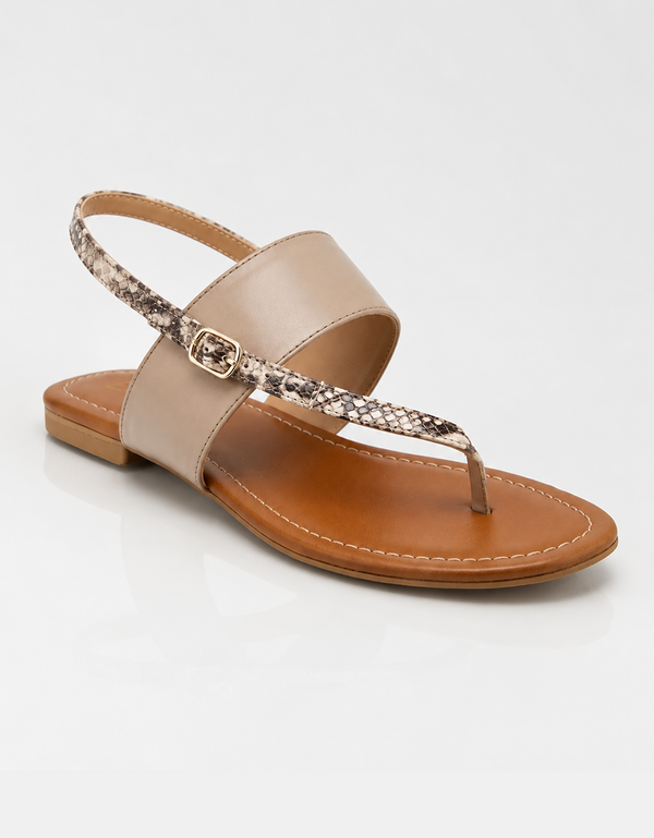 Beige flat sandals for women featuring a snake textured strap and soft padded sole