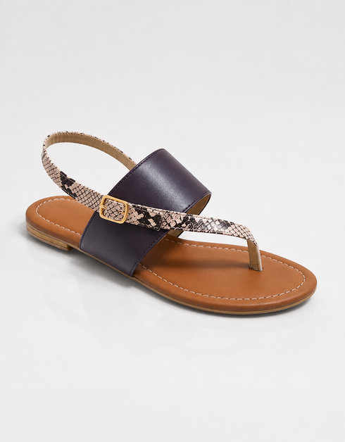 Brown flat sandals for women featuring a textured strap and comfortable sole