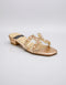 Front view of Gilda luxury gold block heel featuring an embellished strap, statement stone buckle, premium synthetic material, and soft padded insole.
