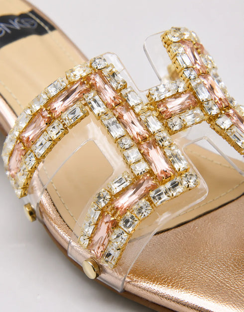 Gilda luxury gold block heels paired with a formal outfit for elegant occasion wear.