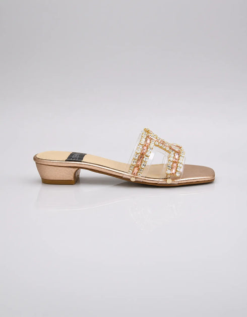 Side profile of Gilda luxury gold block heel highlighting the 1.5 to 2 inch block heel, embellished strap, and elegant gold finish.