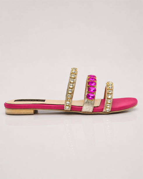 Side view of pink triple strap sandals with stone embellishments