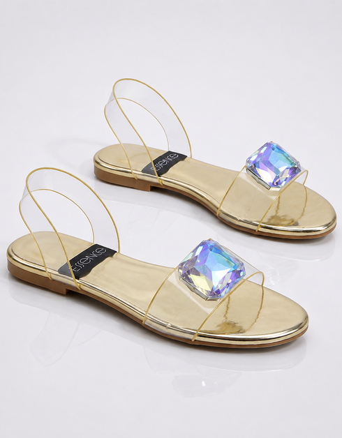 Pair of gold rhinestone flat sandals for women with transparent straps elegant summer footwear Pakistan