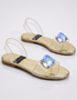 Pair of gold rhinestone flat sandals for women with transparent straps elegant summer footwear Pakistan