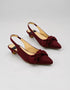 Pair of Marcelle burgundy bow slingback pumps with elegant bow detail, pointed toe, and premium textile finish.