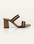 Side profile of brown block heel sandals with open toe and braided straps