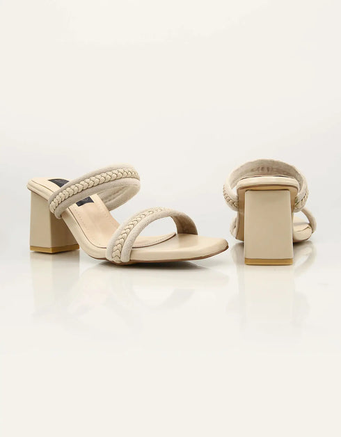 Mystique Marvel Beige Braided Block Heels β Pair of ivory women's block heel sandals with braided strap design Essence by Rubina