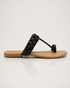 Side view of black braided strap flat sandal minimal design