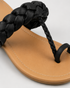 Top view of black toe loop braided flat sandals for women
