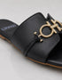 Close up of the gold metal buckle on Nova Chic Comfort Flat Sandals in Black with premium craftsmanship.