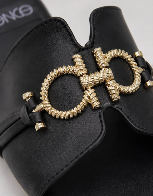 Nova Chic Comfort Flat Sandals in Black paired with a casual outfit for comfortable everyday styling.