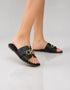 Model wearing Nova Chic Comfort Flat Sandals in Black styled for everyday casual wear.