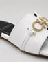 Close up of the gold metal buckle on Nova Chic Comfort Flat Sandals in White showing the elegant hardware.