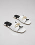 Pair of Nova Chic Comfort Flat Sandals in White with premium synthetic material and cushioned footbed.