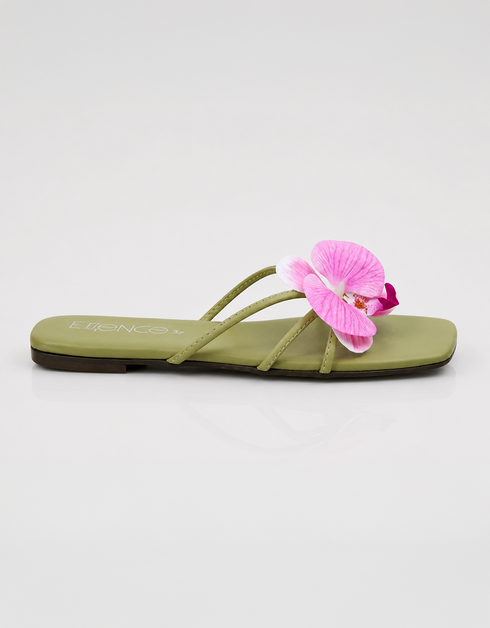 Side view of pink floral flat sandal with olive green straps and minimal design