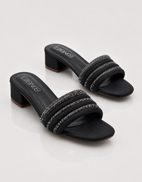 Pair of black glitter strap low block heel sandals designed for parties, dinners, and festive occasions.