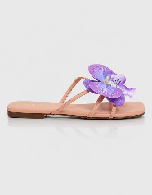 Side view of purple floral flat sandal with orchid detail and slim strap design