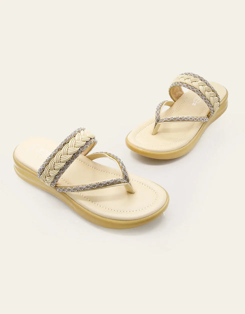Beige thong flat sandals pair