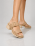 Women beige wedge sandals worn