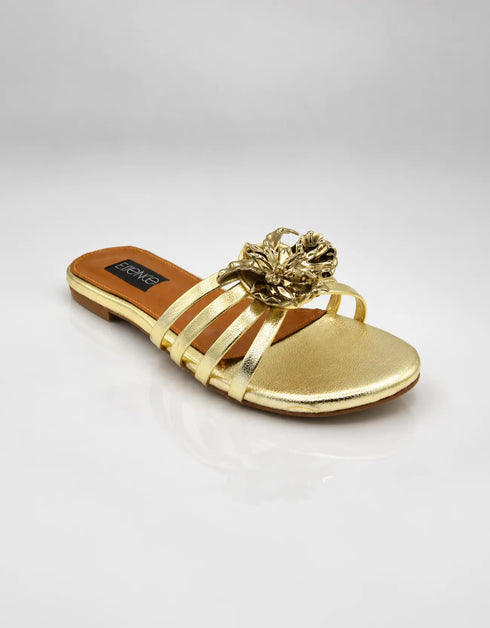 Imperial gold handmade flat sandals front view with metallic flower embellishment by Essence by Rubina