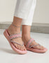 Pink braided flat sandals pair