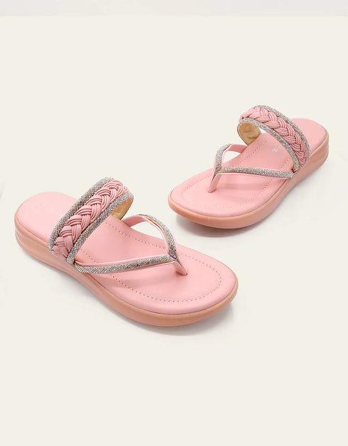 Pink flat sandals pair