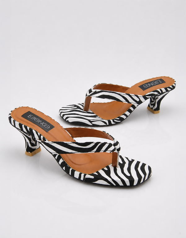 Zara zebra print kitten heel thong sandals pair flat lay showing square toe and animal print design by Essence by Rubina Pakistan