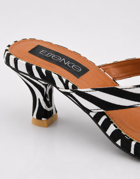 Close up of sculptured zebra print kitten heel and tan cushioned footbed on Zara sandals by Essence by Rubina Pakistan