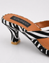 Close up of sculptured zebra print kitten heel and tan cushioned footbed on Zara sandals by Essence by Rubina Pakistan
